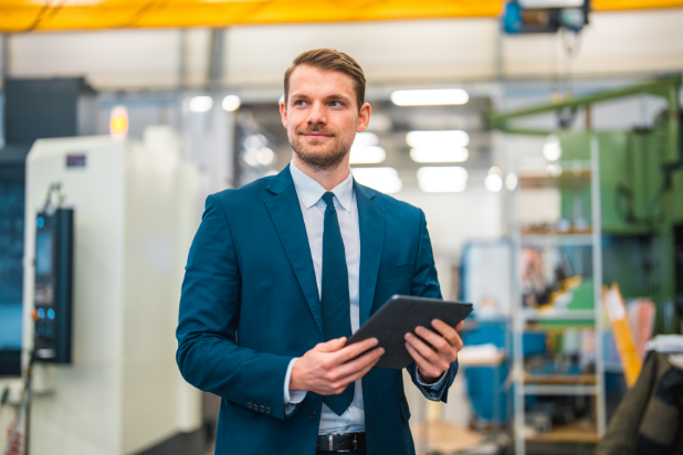 Man holding an iPad on the Sage Intacct parter page
