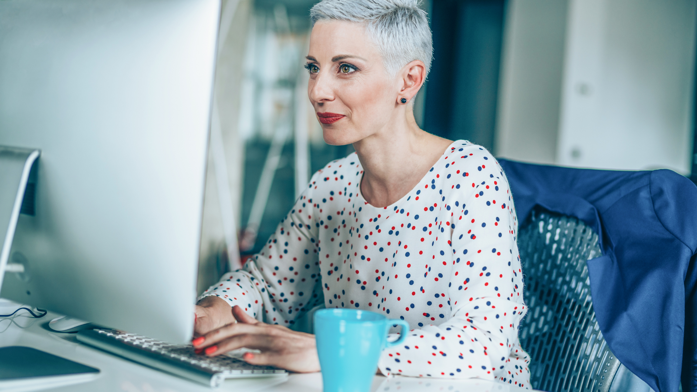 Woman looking at computer screen 